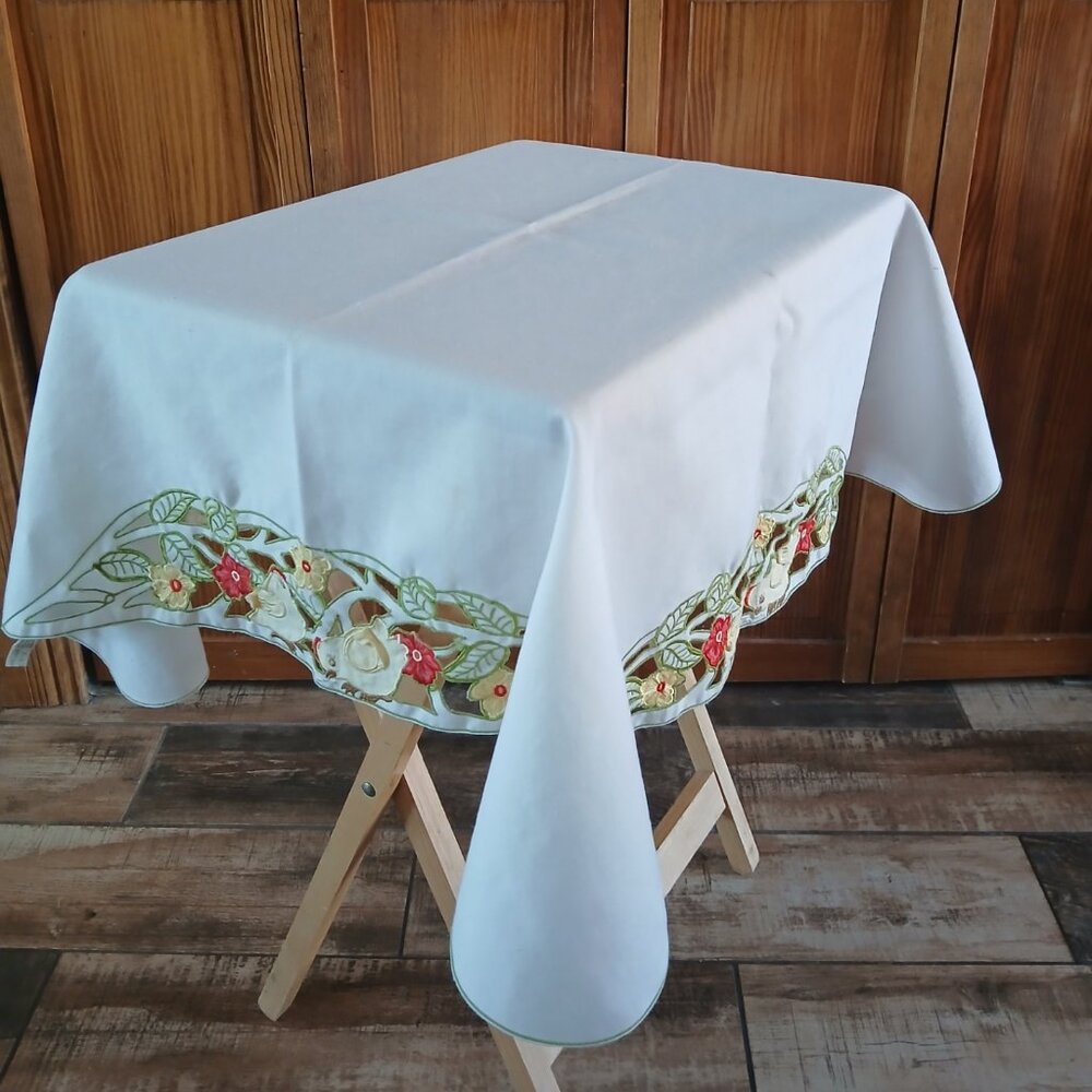 Very nice white table topper w/Easter related decoration